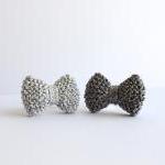Bow ring knitted in gun met..